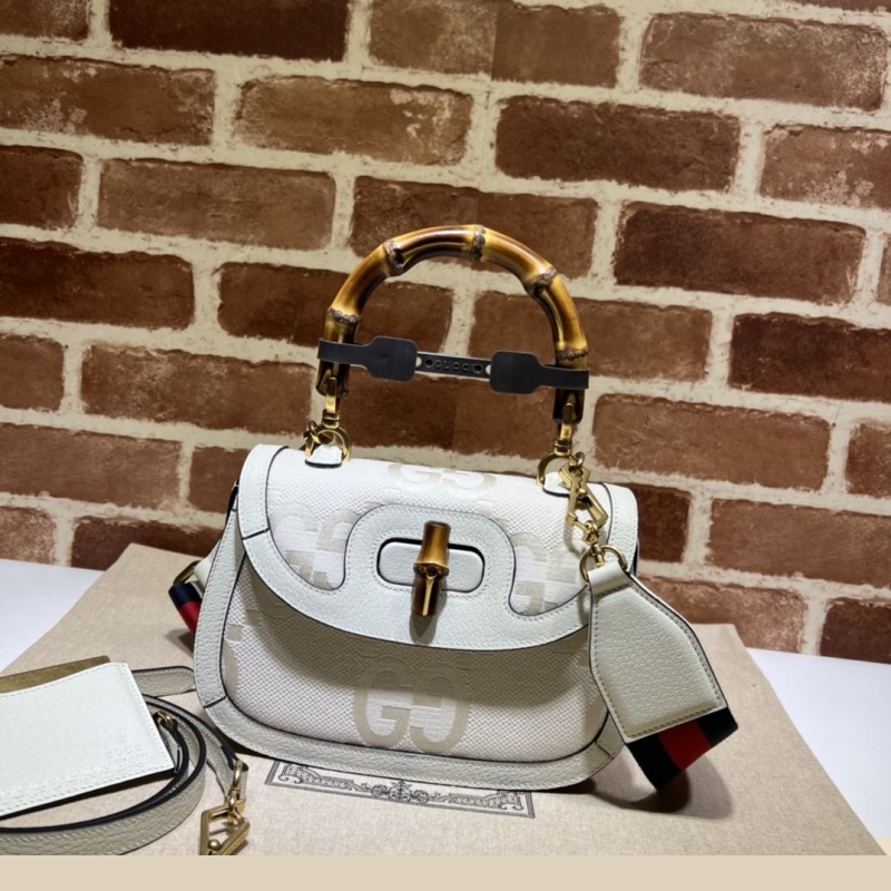 G*u*i top handle bags
